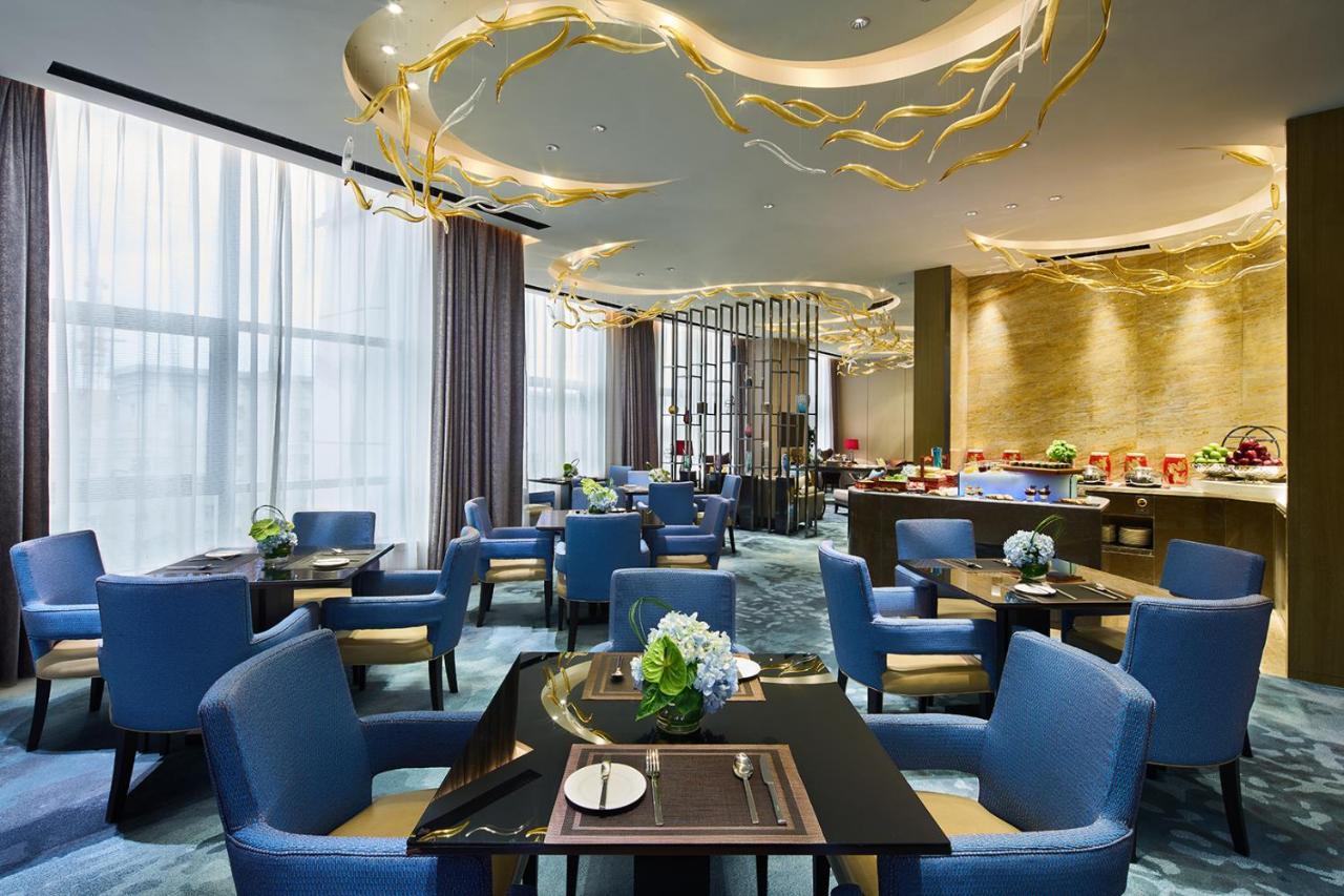 Hotel Wanda Realm Qiqihar Exterior foto