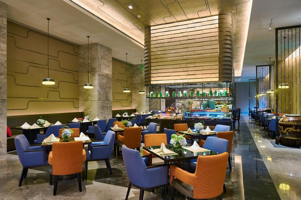Hotel Wanda Realm Qiqihar Exterior foto